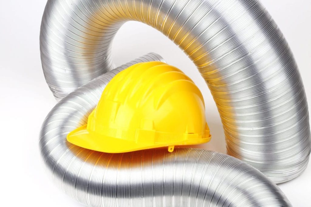 yellow hard hat and air vent