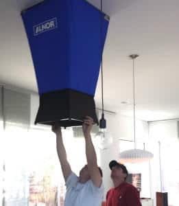 Man inspecting AC unit
