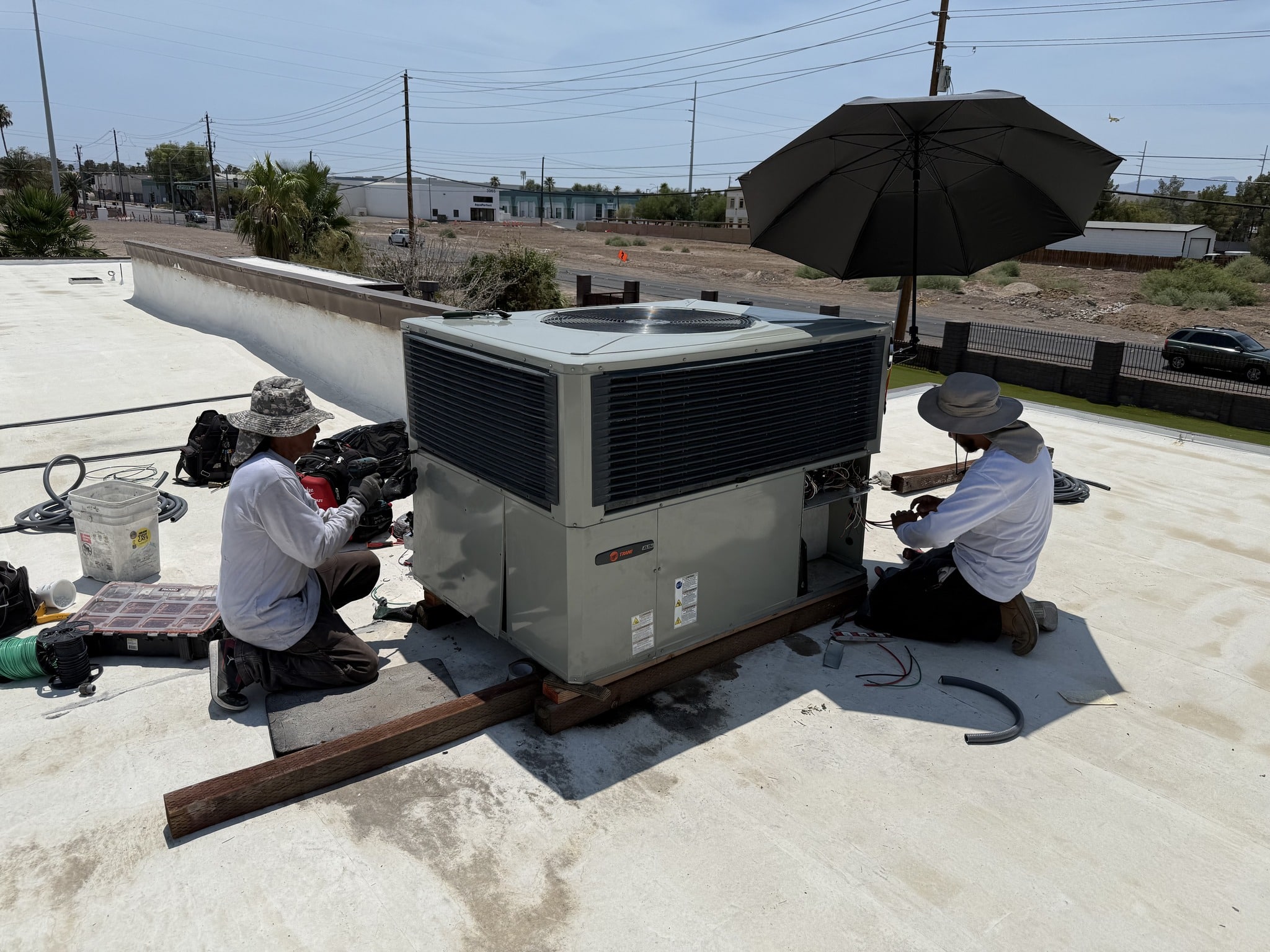 Legacy A/C technicians installing new unit